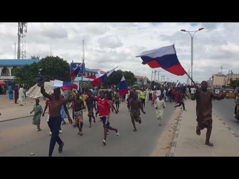 Nigerian Protesters Arrested for Waving Russian Flags Amid Hardship Rallies